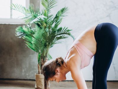 Aromatic candles and a small plant in yoga studio